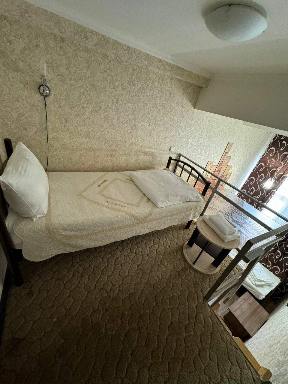 Фотографии номера Небольшой двухместный номер с 2 отдельными кроватями в Хостеле Тверская 5 Москва